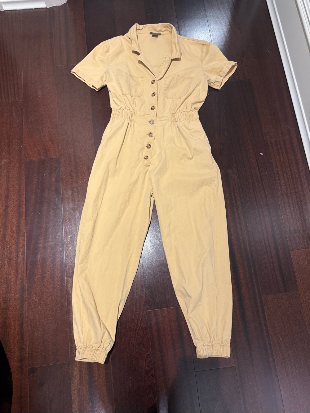 Sans Souci Short-Sleeve Button-Front Jumpsuit in Light Tan
